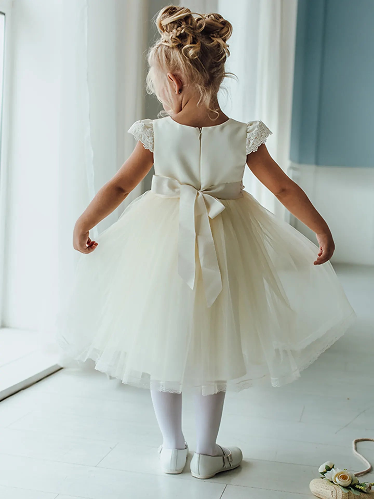 Madina Fluffy white dress with beads for a baby girl