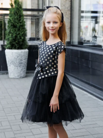 Stylish girl's dress with wide tulle tired skirt and a bow Madelaine